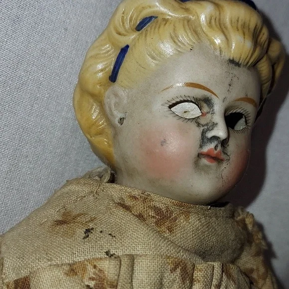 Antique China Head Doll with Blonde Hair & Blue Ribbon in Hair Partial Body